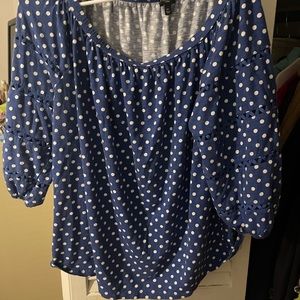 Woman’s top blue and white polka dots with a detailed sleeve